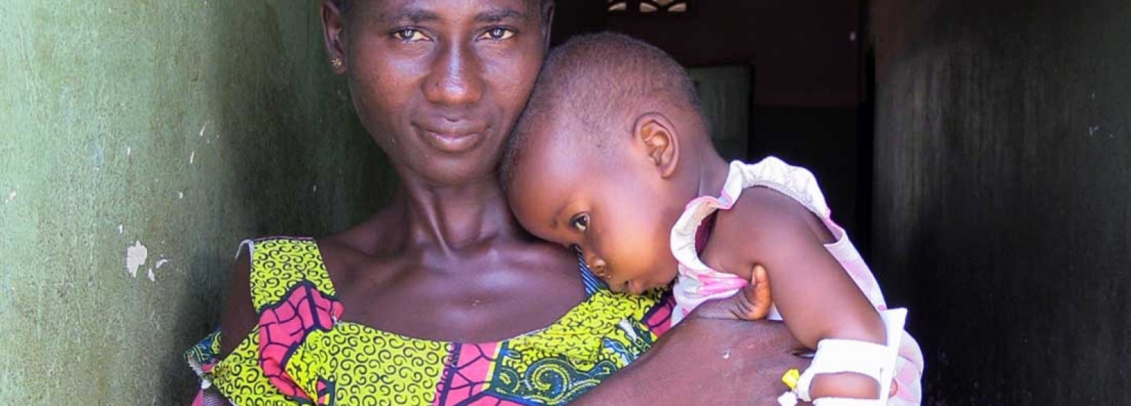 Woman holding children